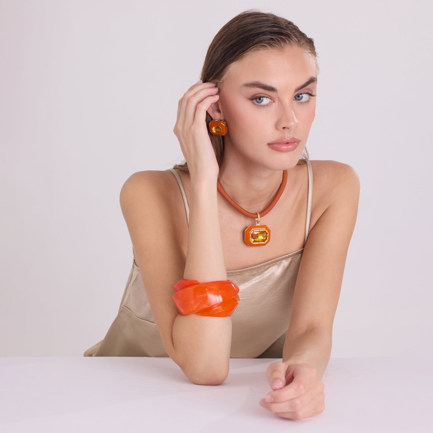 Brigite Polished Orange Resin Carved Bangle
